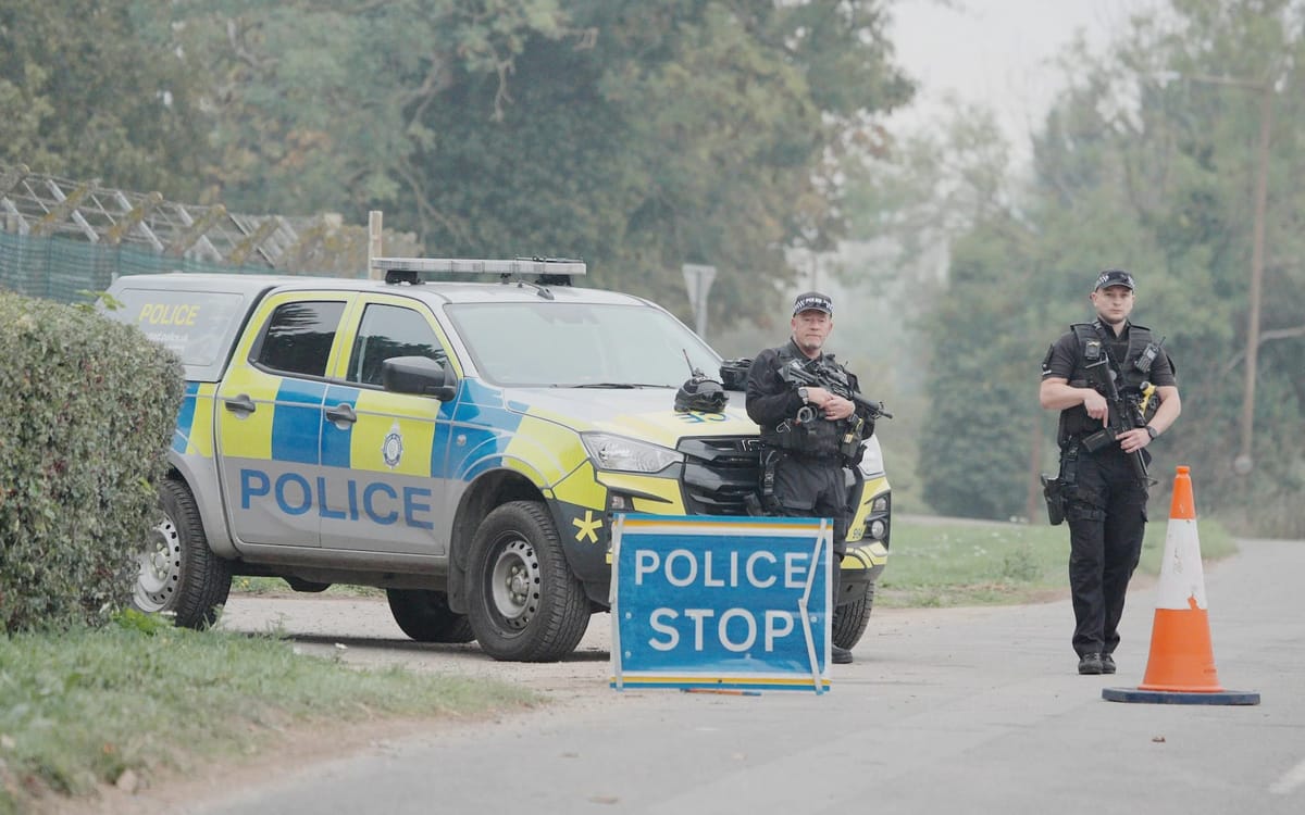 Armed police at a checkpoint near RAF Fairford in Gloucestershire on Monday
