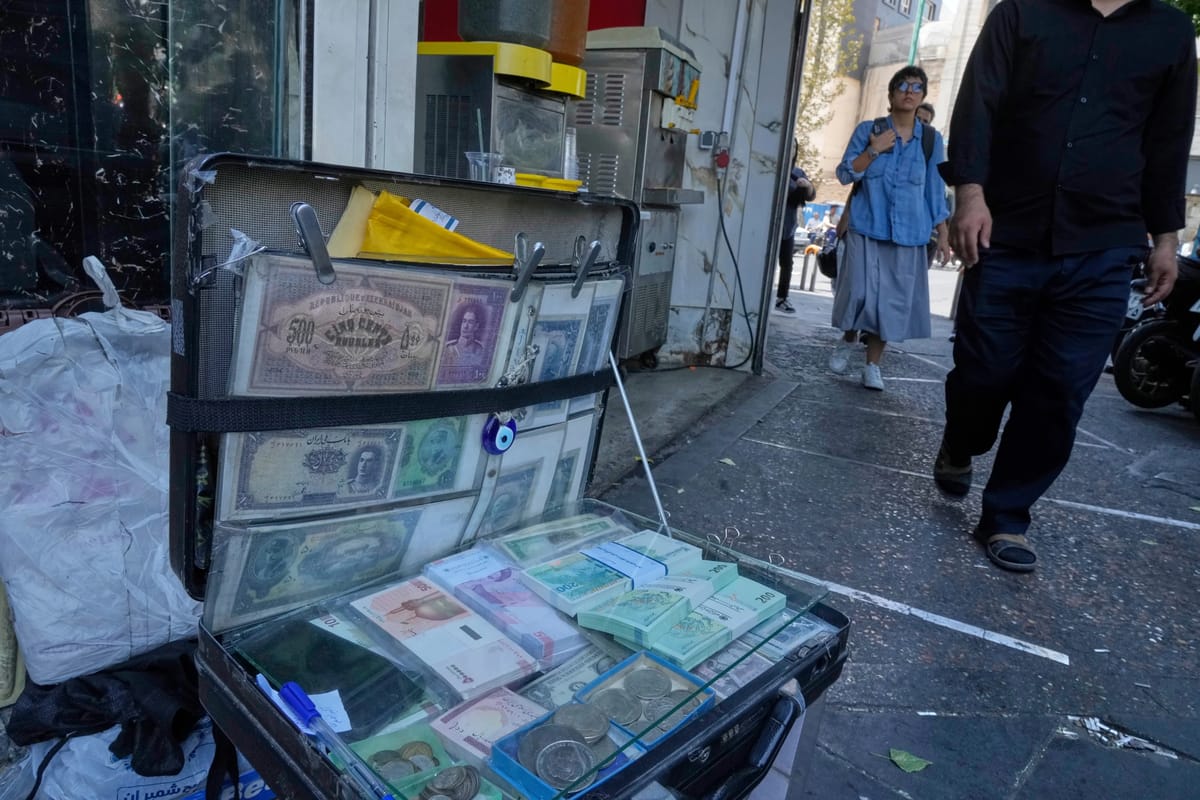 Iranian street money exchanger at Ferdowsi Square, in downtown Tehran, Iran