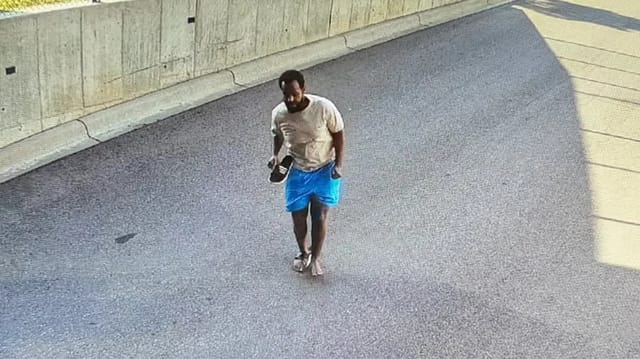 Minnesota Fraud Suspect Caught After Jumping From Building During FBI Raid