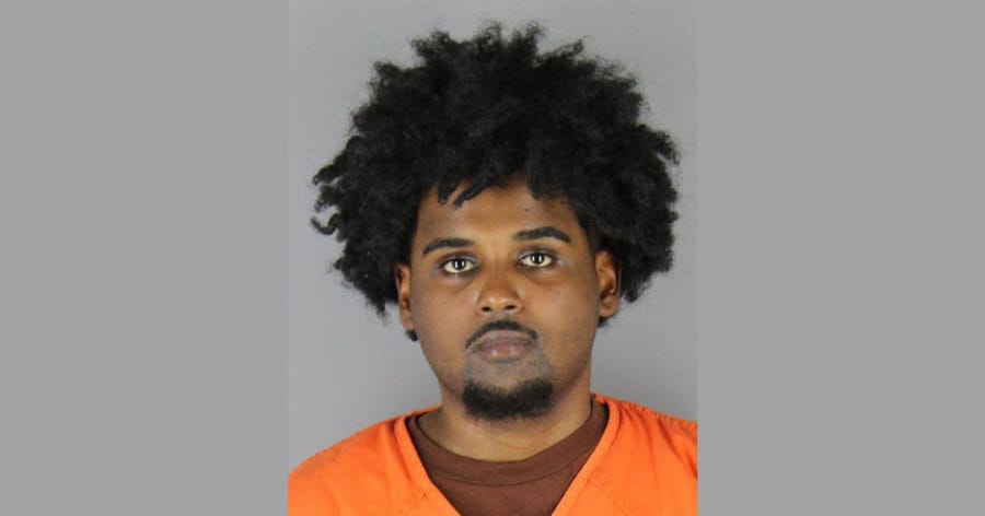 Abdulrahman Abdi, 22, was booked into the Hennepin County Jail on weapons charges.