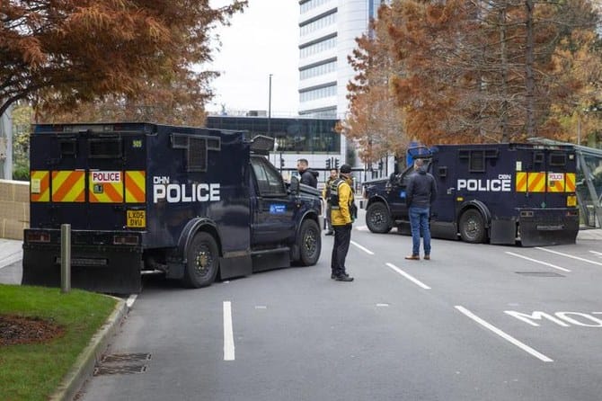 Police cars and rifle-armed security stood guard outside Iran International’s bureau in Chiswick, west London