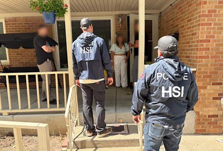 Homeland Security agents making an arrest in the Kansas City area.